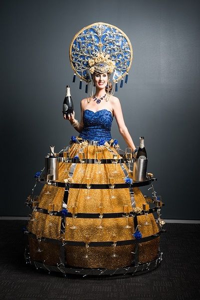 1517446108 sacred circus regal champagne hostess 1