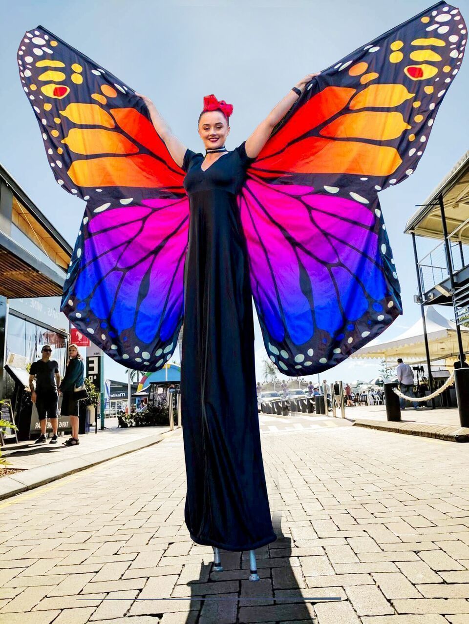 butterfly stilt walkers